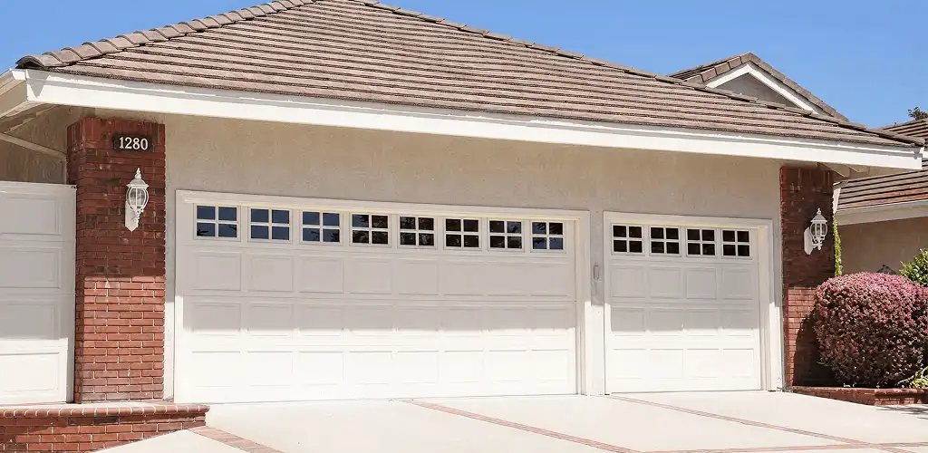 Residential garage door repair service for a double garage door in San Francisco, CA