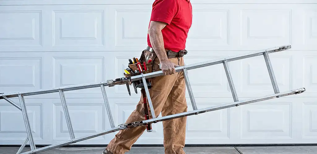 Garage door repair technician arriving with tools and ladder in San Francisco, CA