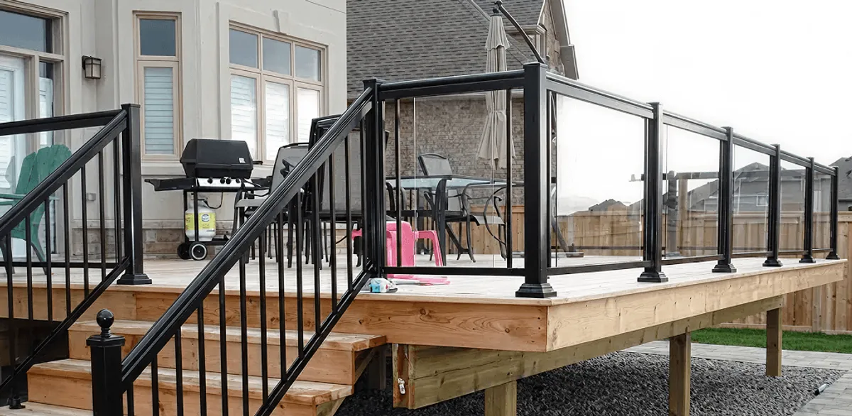 Handrail installation on a deck staircase for safety and code compliance in San Francisco, CA