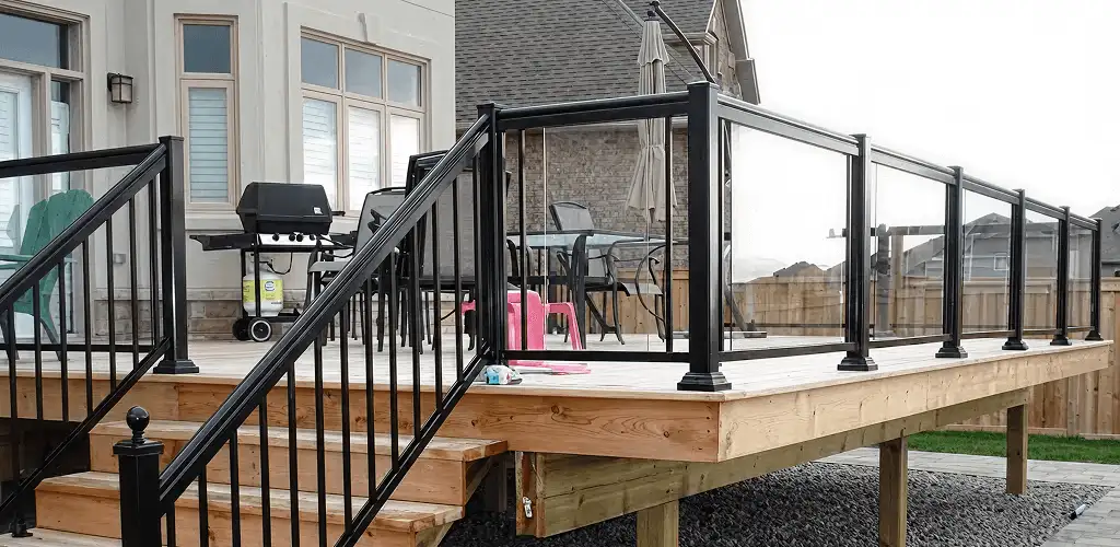 Handrail installation on a deck staircase for safety and code compliance in San Francisco, CA
